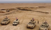 Armed factions in Iraq claim responsibility for attacks on US military bases in Syria