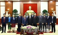 Nguyên Phu Trong reçoit une délégation du Parti Populaire Révolutionnaire du Laos
