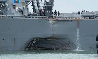 Des restes humains retrouvés dans le navire de guerre américain accidenté