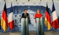Zone euro et migrants: Macron et Merkel affichent leur unité