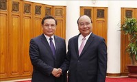 Nguyên Xuân Phuc reçoit le président du Front d'Édification nationale du Laos