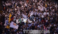Thousands march in support of Colombia peace deal