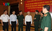 越共中央政治局检查团与中央军委常委会座谈