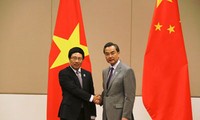 越南政府副总理兼外长范平明会见中国外长王毅