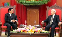 越南党政领导人会见老挝人民革命党中央对外部代表团