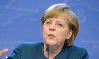 德国总理默克尔：要尽早解决移民危机