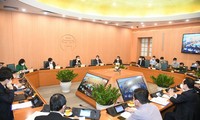 政府副总理武德担与河内市举行新冠肺炎疫情防控工作会议