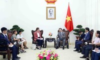 政府副总理陈红河会见世界卫生组织驻越南代表