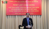 Presiden Tran Dai Quang melakukan pertemuan dengan komunitas orang Vietnam di provinsi Champasak (Laos)