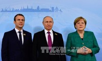 Merkel, Macron und Putin führen Telefongespräch über Syrien