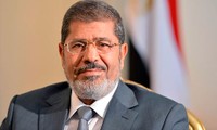 Presiden Mesir, Mohamed Morsi berusaha sekuat tenaga meredakan ketegangan