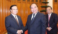 Deputi PM Nguyen Xuan Phuc menerima delegasi Kementerian Perencanaan dan Investasi Laos