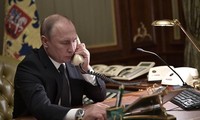 Путин провел телефонную беседу с Меркель и Макроном