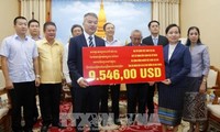 Cộng đồng người Việt quyên góp ủng hộ người dân Lào gặp thiên tai