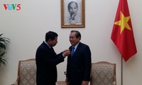 Phó Thủ tướng Thường trực Trương Hòa Bình tiếp Chánh án Tòa án nhân dân tối cao Lào 