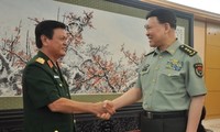 Memperkuat kerjasama antara tentara Vietnam dan Tiongkok