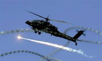 Amerika Serikat  menggelarkan helikopter dalam serangan udara kepada IS