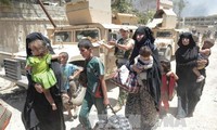  Pasukan-pasukan Irak membuka jalan keluar buntur bagi ratusan warga sipil di kota Mosul