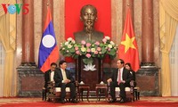 President Tran Dai Quang: Vietnam strongly supports Laos’ reform