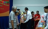 President presents gifts to disadvantaged people