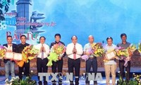 Awards given to winners of song writing contest to honor martyrs 