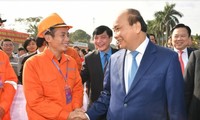 PM attends Tet program with workers, inaugurates Memorial House of Nguyen Duc Canh