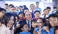 President celebrates school day with students orphaned by COVID-19 