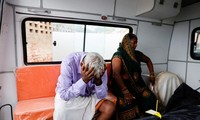Six arrested for stampede in India