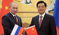 Russia, China pledge to boost bilateral ties