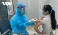 Female frontline healthcare workers get COVID-19 vaccine shot