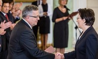 Polish President formally approves new government