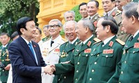 President Truong Tan Sang receives war veterans of Division 1