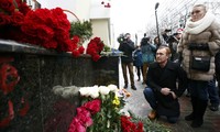 Russia holds national day of mourning for plane crash victims