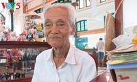 Duong Van Ngo, a public letter writer at the Saigon Central Post Office 