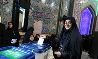 Iran conservatives claim victory after record low turnout