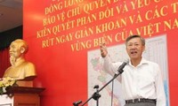 Cộng đồng người Việt Nam tại Lào phản đối hành động của Trung Quốc