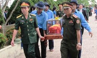 Truy điệu và an táng hài cốt liệt sĩ quân tình nguyện và chuyên gia Việt Nam hy sinh tại Lào 