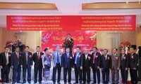 Việt kiều tại Lào chào mừng Đại hội X và Đại hội XII thành công tốt đẹp