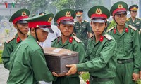 Truy điệu, an táng 12 hài cốt liệt sỹ quân tình nguyện Việt Nam hy sinh tại Lào