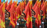 Desfile militar en día de la reunificación nacional