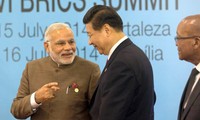 Mejoran China e India confianza política