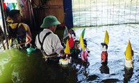 Teatro de títeres acuáticos de los campesinos- artistas de Hong Phong 