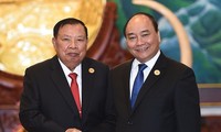 Vietnam y Laos determinados a fortalecer la buena vecindad y cooperación integral