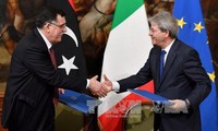 Firman Italia y Libia acuerdo migratorio