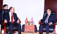 Vietnam y Laos buscan incrementar cooperación para desarrollo sostenible