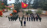 Solemnes ceremonias de izamiento de bandera en zonas fronterizas e islas de Vietnam por el Año Nuevo Lunar