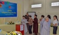 Người Việt Nam tại Lào tiếp tục quyên góp tiền ủng hộ người dân Attapeu