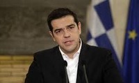 Greek Prime Minister warns of difficulties after extending its bailout 