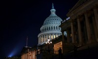 US Congress averts historic default, approves debt-limit suspension