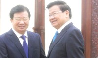  Phó Thủ tướng Trịnh Đình Dũng hội kiến Thủ tướng và Chủ tịch Quốc hội Lào
